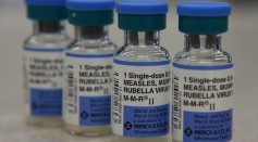 In this photo illustration, vials of measles, mumps and rubella vaccine are displayed on a counter at a Walgreens Pharmacy on January 26, 2015 in Mill Valley, California. 