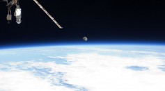 Earth's horizon and the moon can be seen from the International Space Station July 12, 2011 in space. 