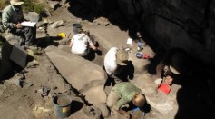 Archaeologists excavate a rockshelter in the Peruvian Andes that was used more than 12,000 years ago by human settlers. 