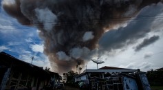 Mount Sinabung spews pyroclastic smoke, seen from Simpang Empat village in Karo District, North Sumatra, Indonesia.