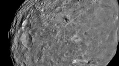 NASA Dawn Spacecraft takes picture of the giant asteroid Vesta about 3,200 miles above the surface before travel to asteroid Ceres on July 24, 2011. 