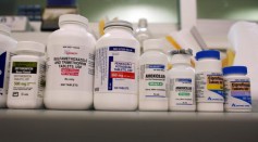 Bottles of antibiotics line a shelf at a Publix Supermarket pharmacy August 7, 2007 in Miami, Florida