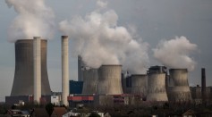 Steam rises from cooling towers at the Niederaussem coal-fired power plant of RWE Power AG on March 11, 2017 near Bergheim, Germany.