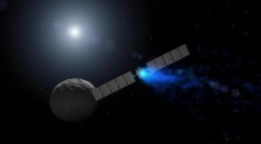 This artist's rendering shows NASA's Dawn spacecraft maneuvering above Ceres with its ion propulsion system.