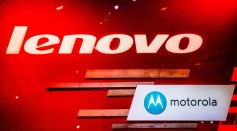 Logos sit illuminated outside the Lenovo and Motorola pavilion during the second day of the Mobile World Congress 2015 at the Fira Gran Via complex on March 3, 2015 in Barcelona, Spain