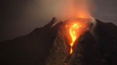 Hot lava from a lava dome of Mount Sinabung on Jan, 5, 2014 in Karo District, North Sumatra, Indonesia. 