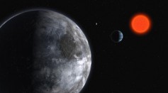 Artist impression of the planetary system around the red dwarf, Gliese 58, situated 20 light years away, discovered in 2007.