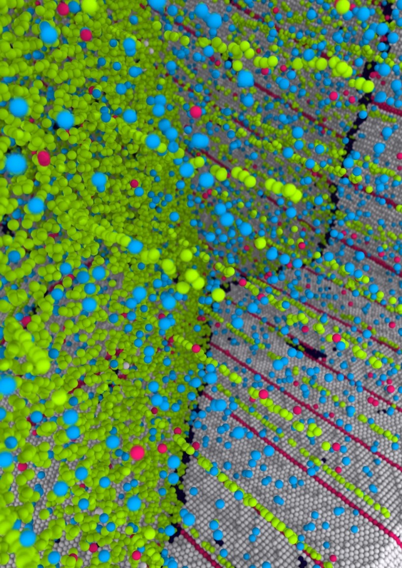 Computer Simulation: Segregation of Copper Atom Impurities into Internal Defects and Grain Boundary (IMAGE)