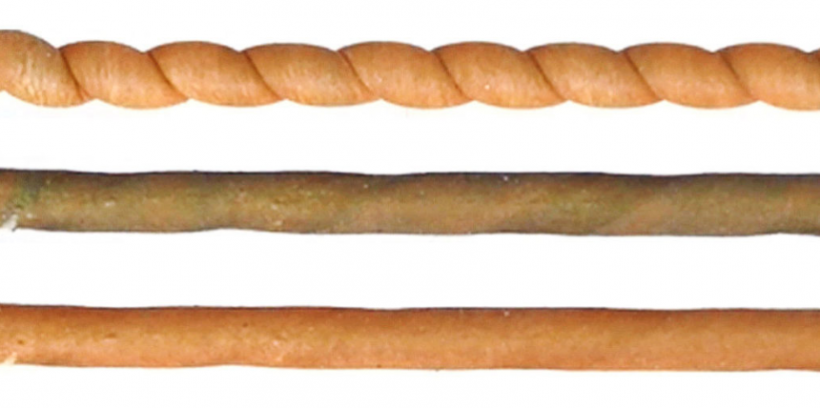 A coiled fiber at room temperature (orange, top) cools when untwisted (brown, middle) before returning to room temperature over time (bottom).