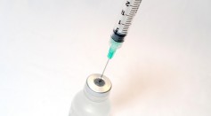 Vaccine and syringe 