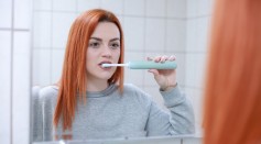 Science Times - Should You Rinse Your Mouth Every After Brush? Here’s What Dental Experts Say