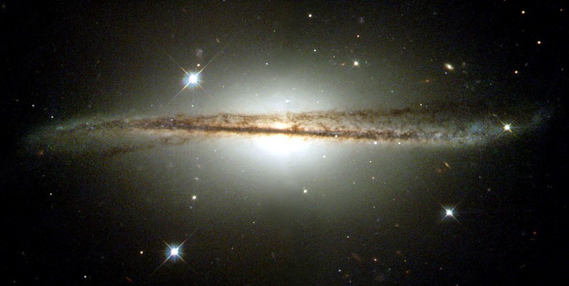 Hubble Images Of Warped Disk Galaxy