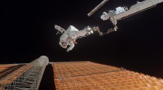 Astronaut Scott Parazynski repairs a damaged ISS solar panel