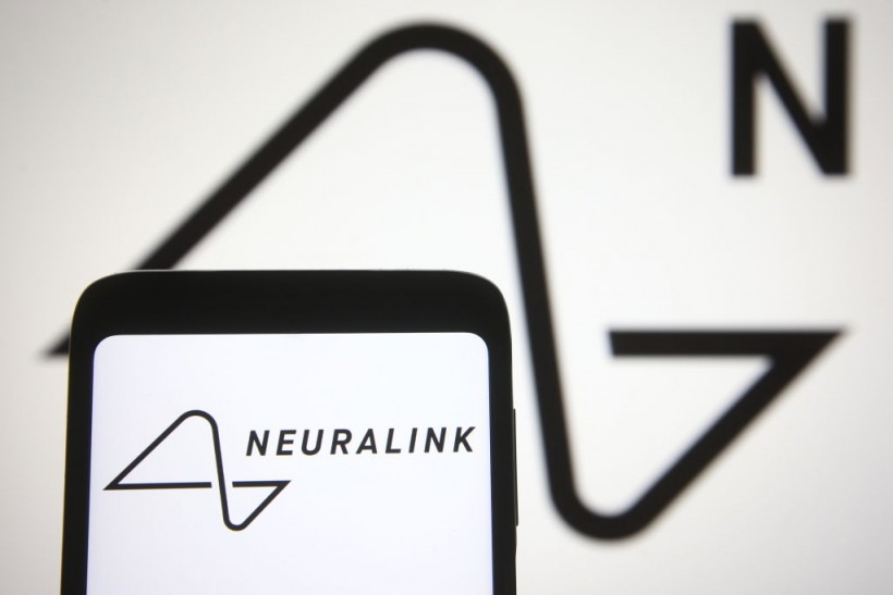In this photo illustration a Neuralink logo is seen on a...
