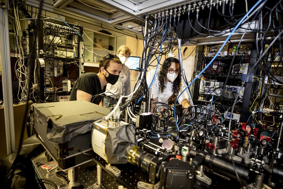 Towards Quantum Computing Physicists Surpass Current Supercomputers
