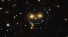 Hubble Sees a Smiling Lens