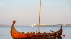 Wooden Viking boat travelling at sea
