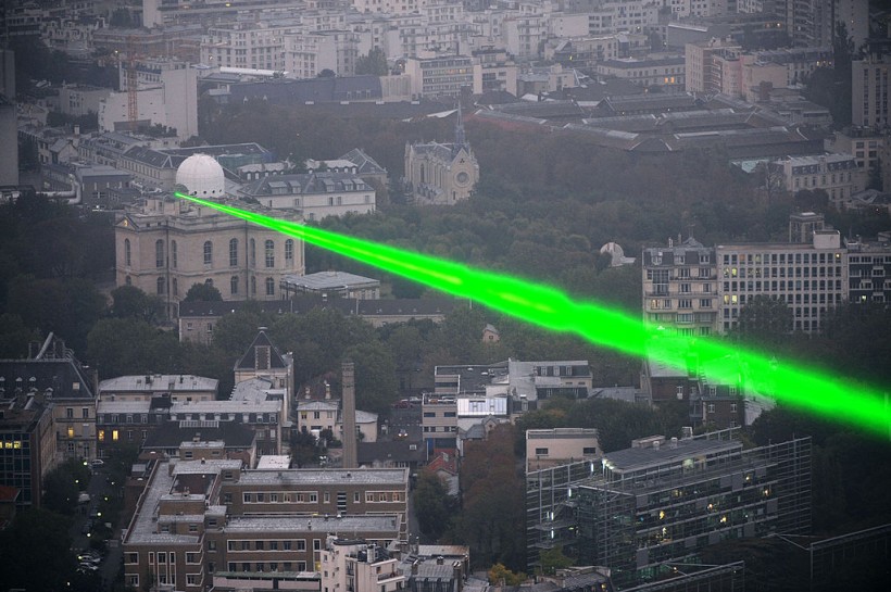 A picture shows a laser beam between the