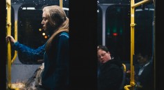 Photo of a Lonely Woman Standing Inside Bus