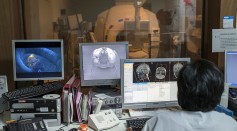 https://www.gettyimages.com/detail/news-photo/doctor-controls-the-progress-of-an-mri-of-a-child-who-first-news-photo/158520141?adppopup=true
