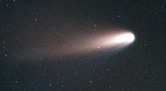 The comet Hale-Bopp appears in the sky over Merrit