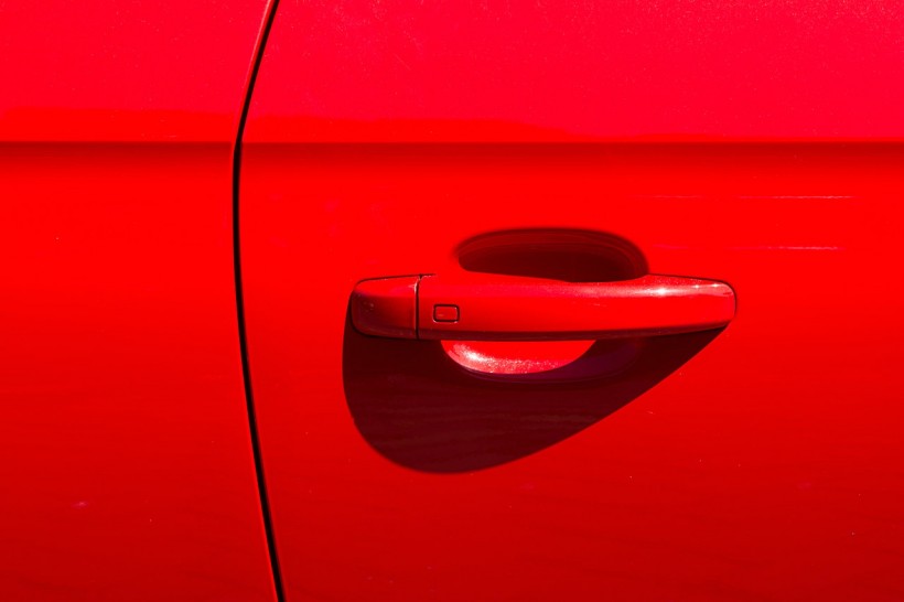 Red Car in Close Up Photography