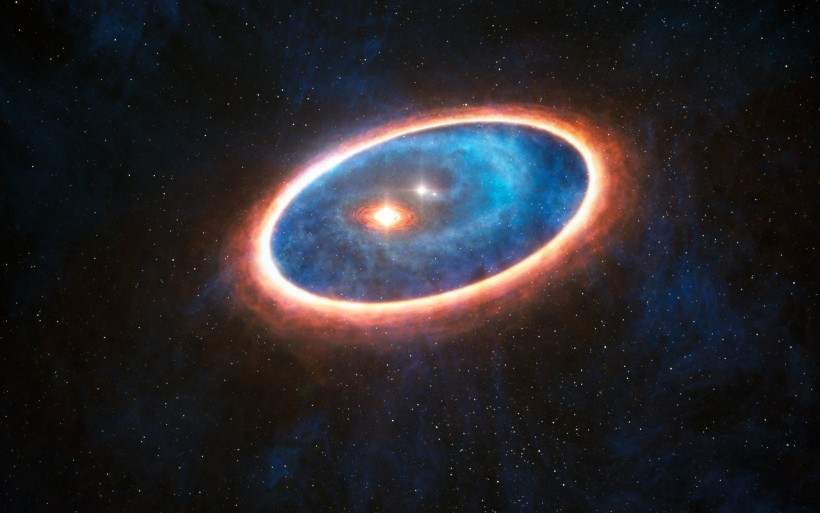 Artist’s impression shows the dust and gas around the double star system