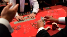 NukkAI System Defeats Eight World Champions of Bridge Card Game