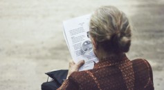 Woman in brown reading