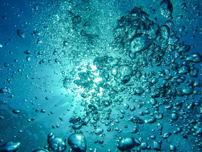 Chemistry Behind the Origin of Life: Researchers Uncovered the Mechanism for Peptide-Forming Reactions in Water