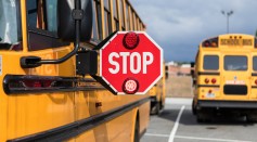 School bus driver doing safety check - stock photo