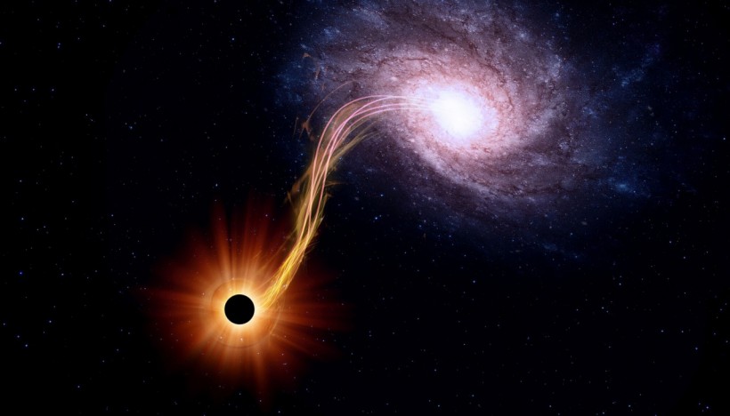  Supermassive Black Hole Gorging on a Star Launches Leftover via 'Relativistic Jets' Toward Earth