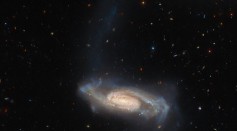  Hubble Space Telescope Spots Long-Armed Galaxy 450 Million Light-Years Away in Great Detail 