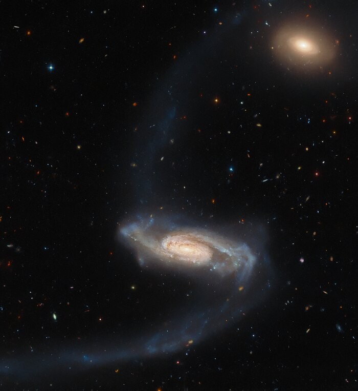  Hubble Space Telescope Spots Long-Armed Galaxy 450 Million Light-Years Away in Great Detail 