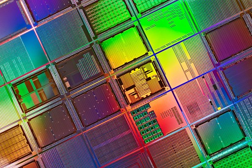 Multi Colored Computer Silicon Wafer Extreme Close-up Shot.