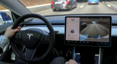 The interior of a Tesla Model 3 electric vehicle is shown in this picture illustration taken in Moscow, Russia