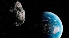 London Bus-Sized Asteroid Will Fly By Earth Friday, NASA Warns  https://commons.wikimedia.org/wiki/File:Asteroid-Earth.jpg  Source https://www.daily