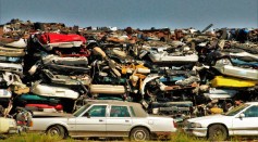 Dumped Cars on the Grass Field