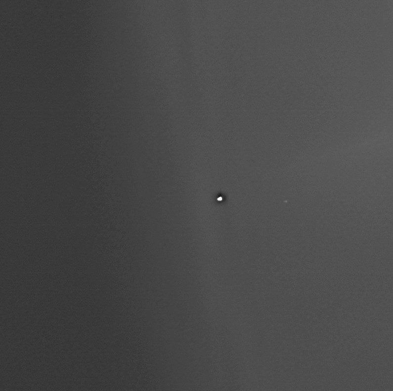 Mars Express Orbiter Captures Earth and Moon From the Martian Perspective, Showing It as a Fuzzy Blob in the Center