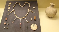 9,000-Year-Old Necklace Buried With 8-Year-Old Child in Neolithic Village Reconstructed, Displayed  at Jordan's Petra Museum
