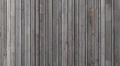 A Fence Made of Gray Wood Panel