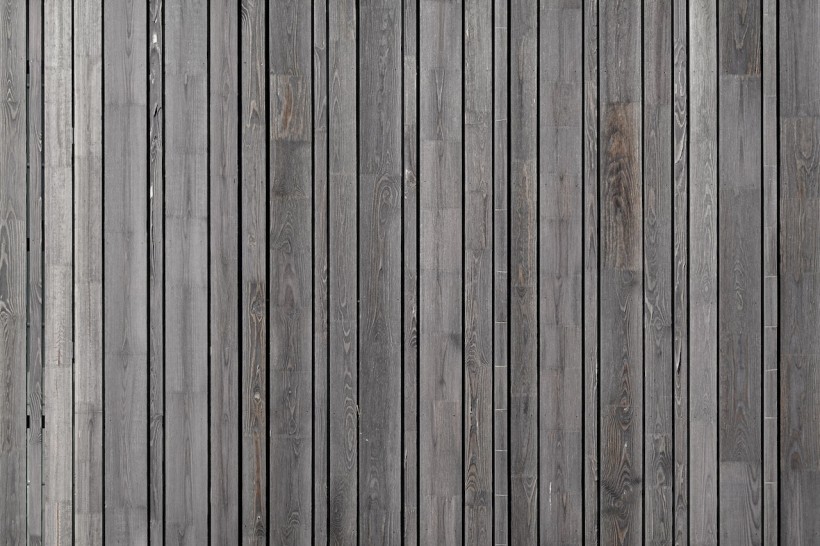 A Fence Made of Gray Wood Panel