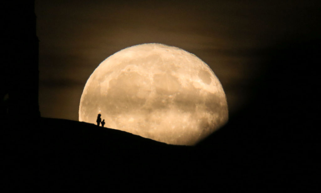 In Photos: See The 'Beaver Moon' Rise To Light Up The Night Sky