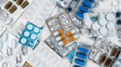 pharmaceuticals in packages of different colors, antibiotics medicine tablets, colorful antibacterial tablets lie, fighting the virus.