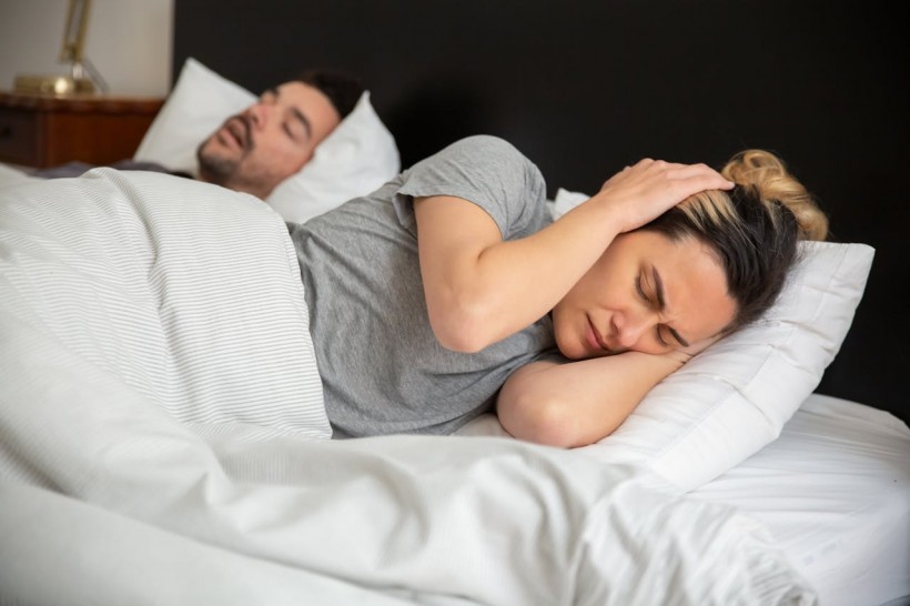 How To Survive Snoring Partners: The Link Between Goal Adjustment and Relationship Satisfaction Amidst Sleep Disorders