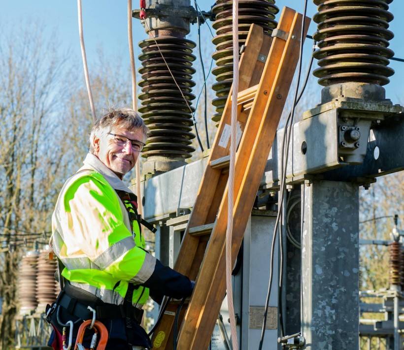 Worker at Electrical Transformer Substation