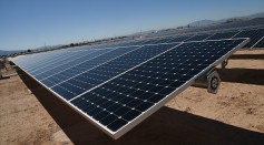 Rows of solar panels operate during a dedication ceremony to commemorate the completion of the 102-acre, 15-megawatt Solar Array II Generating Station at Nellis Air Force Base on February 16, 2016 in 