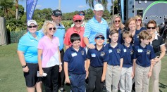 Ernie Els of South Africa poses with a group of children during the Els #GameON Autism clinic as a preview for The Honda Classic on the Champions Course at the PGA National Resort and Spa.