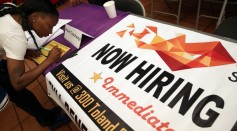 Job Seekers Look For Open Positions At Career Fair In San Francisco