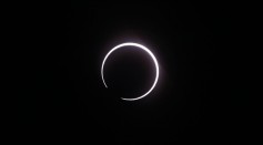 September 1, 2016, in Saint-Louis, on the Indian Ocean island of La Reunion, shows the moon moving to cover the sun, leaving a ring of fire effect around the moon, during an annular solar eclipse.